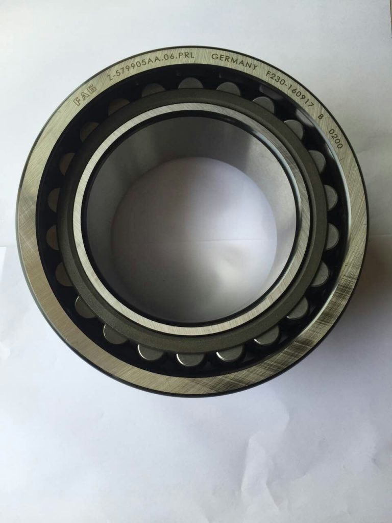 Spherical roller bearing FAG Z-579905AA bearing size 110x180x69/82
